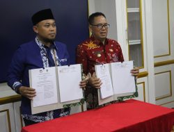 PJ Makmur Marbun Tandatangani NPHD dengan KPU dan Bawaslu Kabupaten PPU